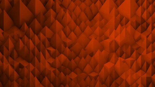 A dynamic 3D low poly geometric surface consisting of sharp orange and brown pyramids shifting in a subtle wave-like motion. This stylized background animation is perfect for abstract tech backdrops o