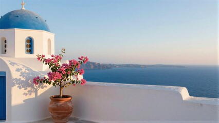 Fototapeta premium Blue-domed church pink flowers white walls overlooking the sea.