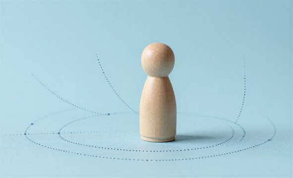 Wooden figure stands alone dotted lines radiate outward against a