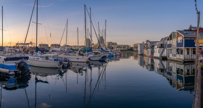 Fisherman's Wharf at sunset with boats and floating houses - Victoria, BC, Canada