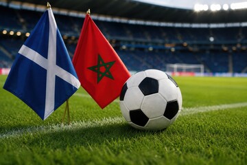 Naklejka premium Flags of scotland and morocco with a soccer ball on a stadium pitch