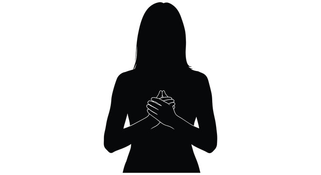 Woman praying with hands clasped together silhouette