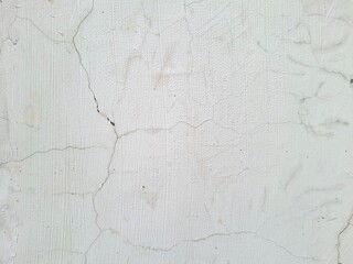 Fototapeta premium White cracked concrete wall background texture