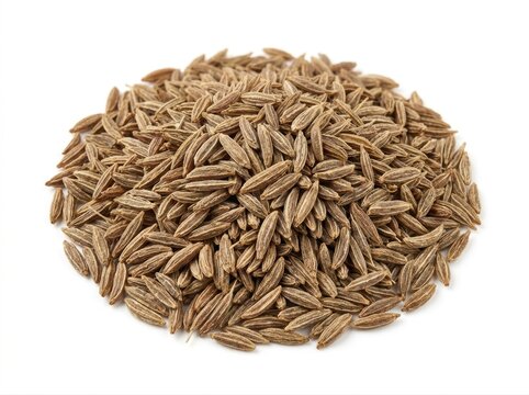 Pile of brown cumin seeds isolated on white background