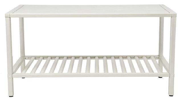 metal side table with open shelf and clean lines in neutral setting