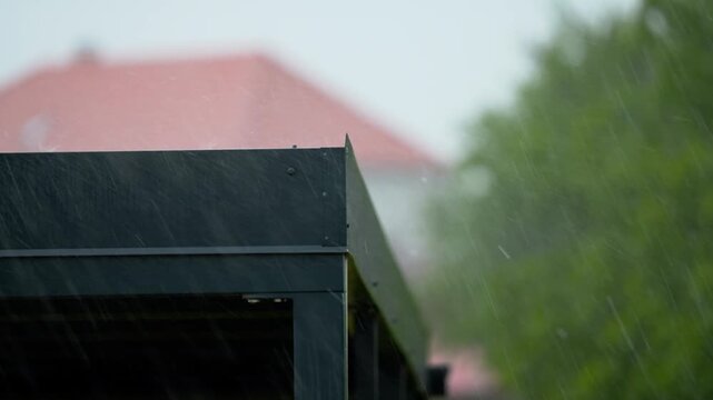 heavy rain fall on the gutter roof 