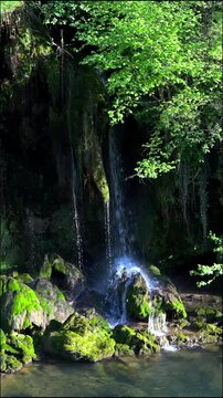 waterfall in the forest close up slow motion clean water 