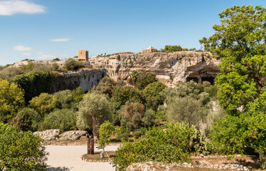 Fototapeta premium The Latomia del Paradiso inside the Neapolis Archaeological Park in Syracuse, Sicily, Italy. Historic archaeological site connected to Greek and Roman history.