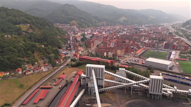 Drone panorama of Mieres del Camin Asturias with mining valley and mountain houses