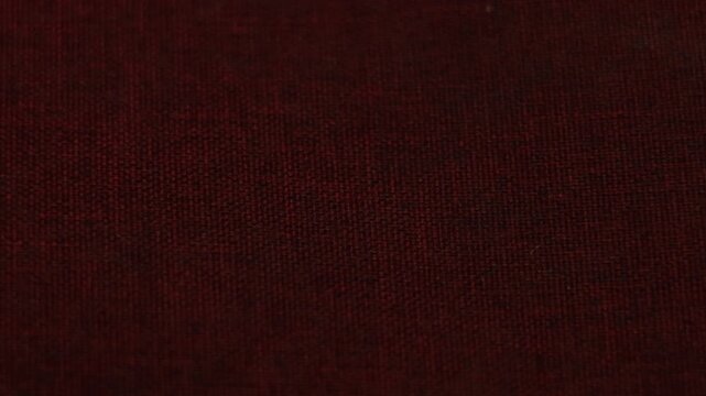Close-up dark red brown fabric textile texture background surface