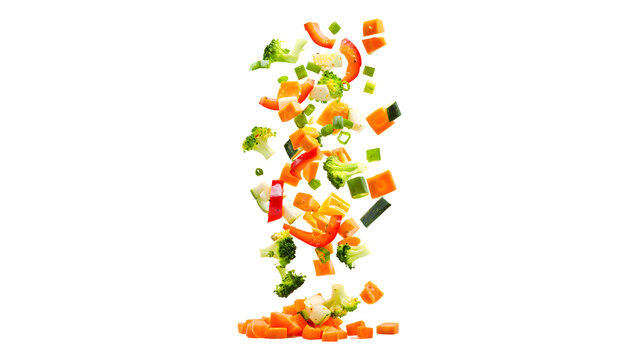 Falling chopped mixed raw vegetables diced carrots and broccoli isolated on transparent background