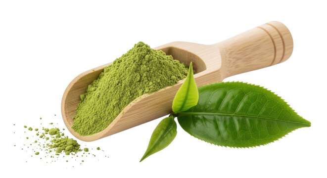 A wooden scoop filled with vibrant green matcha powder, accompanied by fresh green tea leaves, isolated on a solid black background