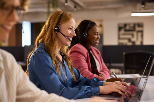 Multiethnic customer service agents on call