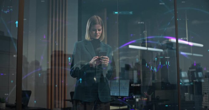 Businesswoman Holds a Smartphone Behind a Glass Office Window Overlaid With Glowing Connectivity Curves, Candlestick Stock Charts and Real-time Financial Data Visualisation for Investment Analysis.