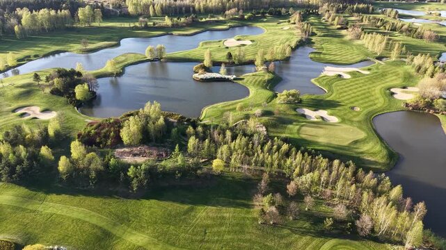 Expansive green fields of a premium golf village