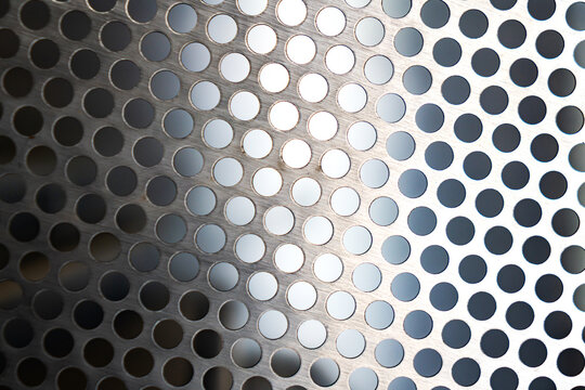 Metal sheet with circular holes