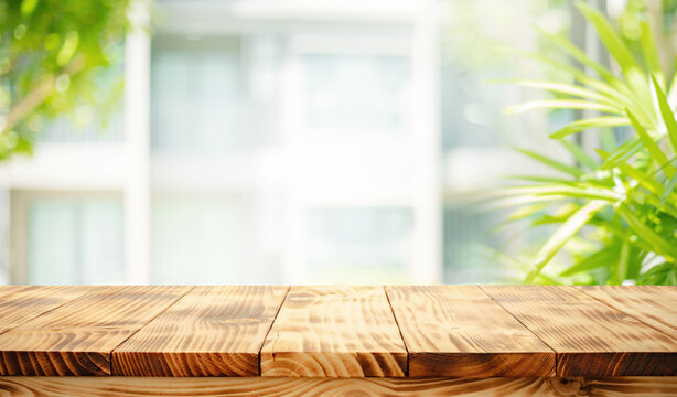 Pine wood texture table top with burn fire wood surface on blur white house wall.