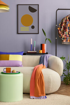 Interior desgin of modern living room interior with mock up poster frame, colorful decorations and accessories, plants, sofa, coffee table. Blue wall. Home decor. Template