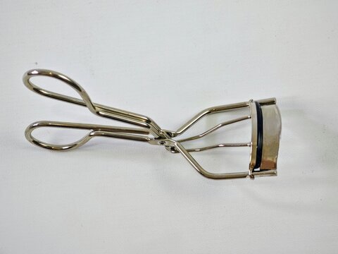 Eye lashes curler
