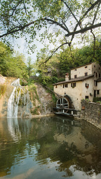 Ancient Molinetto della Croda water mill and waterfall along famous Strada del Prosecco, Veneto Italy