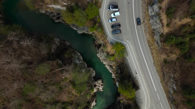 Aerial view of Lechfall waterfall in Fuessen, Upper Bavaria, Germany. Drone panorama of the Lech river canyon, Maxsteg bridge, and the scenic mountain road near the Austrian border.