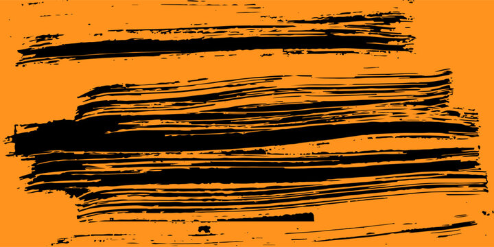 Paint brushes on orange background.Black ink grunge brush strokes.Paintbrush set.Grunge. eps 10