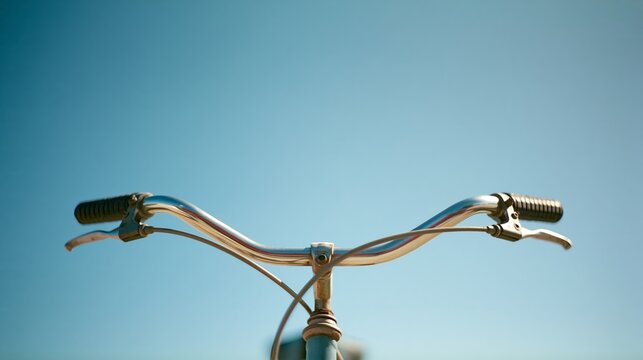 Bicycle handlebars close-up nobody blue sky background