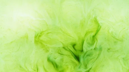 Pour of Milk Into Matcha Latte © Lukas Gojda