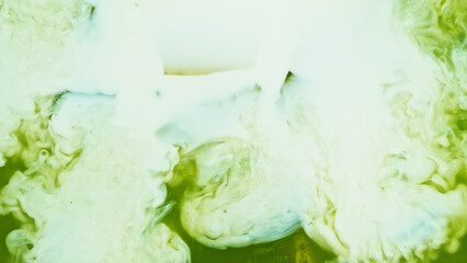 Pour of Milk Into Iced Matcha Latte © Lukas Gojda