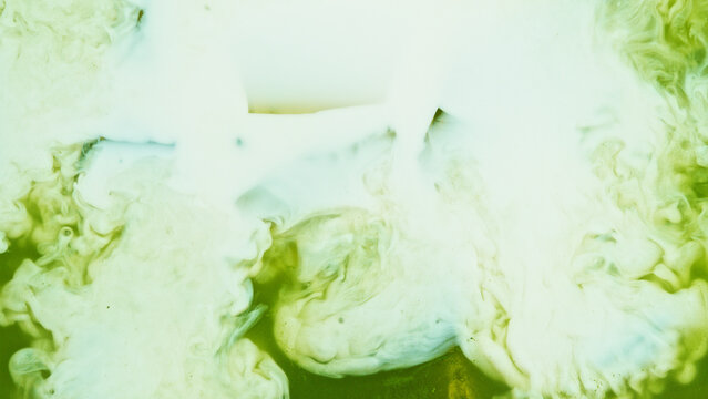 Pour of Milk Into Iced Matcha Latte