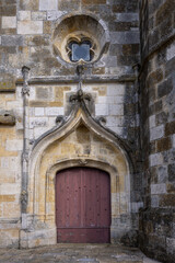 Fototapeta premium The Church of Notre-Dame de Puiseaux is an imposing 13th-century Gothic church, famous for its distinctive spiral spire and historical significance, France