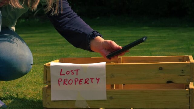 Woman gets lost cellphone from lost property box