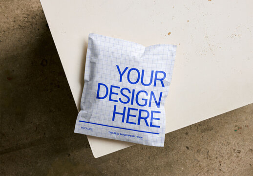 Mockup Of Customizable Paper Mailer Bag On Chair