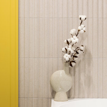 Elegant Cotton Stems in Minimalist Vase Against Textured Wall and Yellow Accent for Modern Home Decor