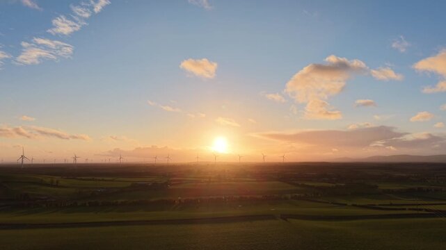 Sunset Over Wind Farm and Irish Countryside &ndash; Aerial 4K 60fps Drone Footage	