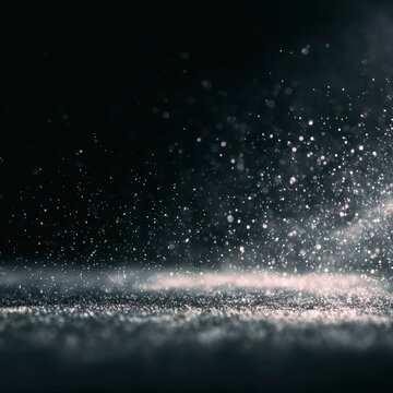 Abstract glitter particles on a dark background
