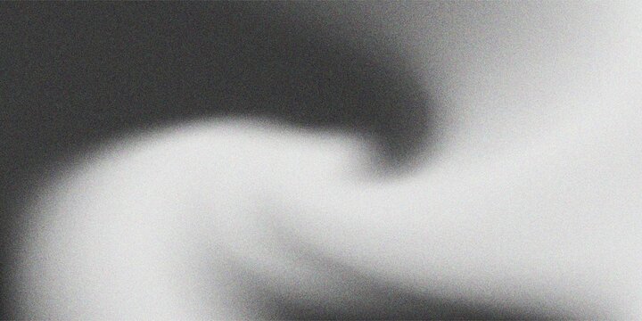 An amorphous black splotch with a spray paint effect. Features a dense, dark core that fades into a fine, grainy mist with soft, irregular edges.