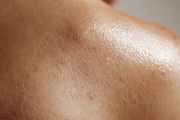 Fototapeta premium Close up macro photography of healthy skin texture with natural sheen and fine pores, detailed skin surface showing subtle hair and moisture glow