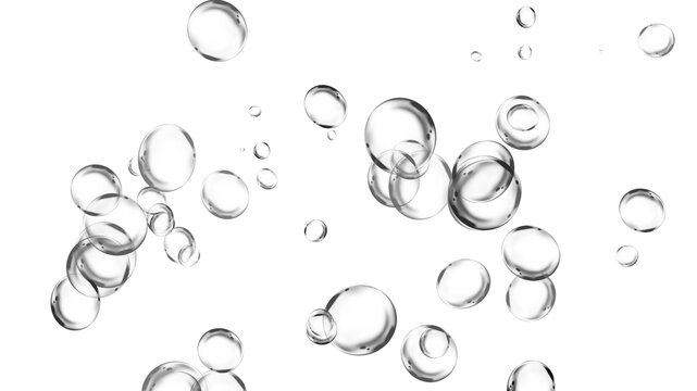 Numerous transparent water bubbles floating and rising against a clean white background.