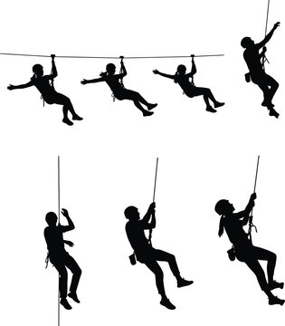 Silhouette people ziplining and rappelling