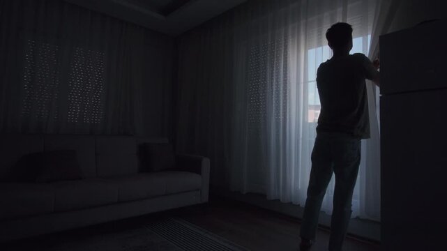 Morning routine opening blinds with natural sunlight in cozy apartment, cinematic light and shadow lifestyle aesthetic