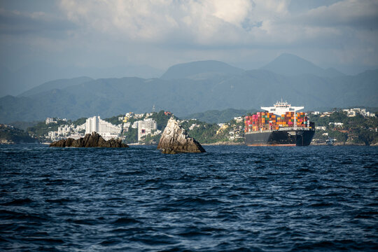Aerial panoramic view of Manzanillo commercial port with cargo ships and bay in Colima Mexico