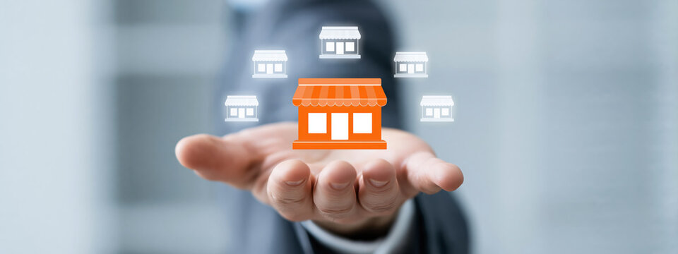 Expansion Strategy Concept: Hand Hold Digital Storefront Icons Business Growth