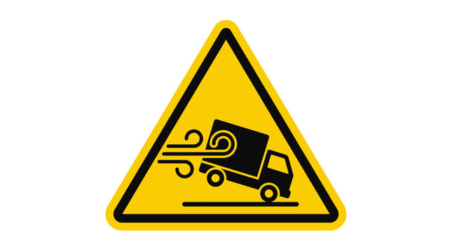 Warning sign indicating strong crosswinds affecting trucks on the road.