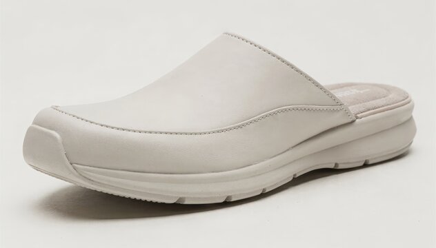 Crafting a backless mule slipper with a closed toe design highlighting the stable forefoot construction for enhanced comfort and everyday wear.