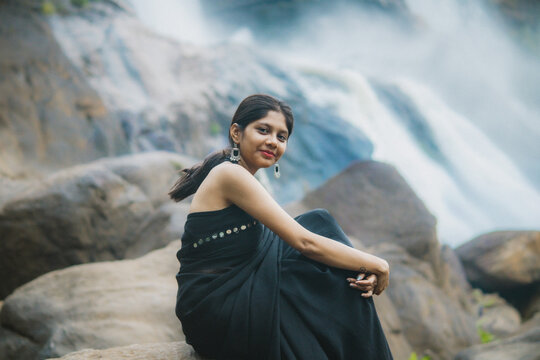 Cinematic Portrait of Indian Girl in Black Saree at Athirappilly Falls