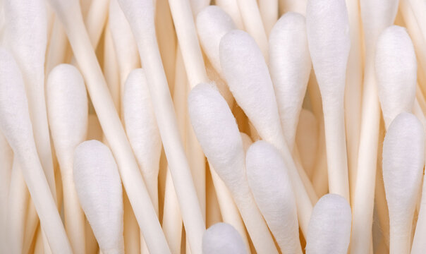 Close up of cotton swabs bunched together.