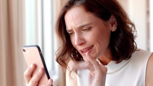 Phone, wave and woman with video call in home, online communication and goodbye for weekend chat. Connection, mobile and person with farewell gesture for virtual conversation, smile and networking