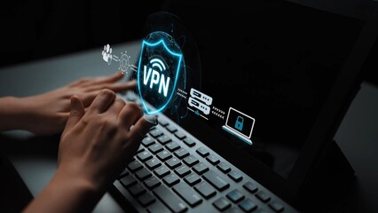 Fototapeta premium Secure Your Online Presence with a VPN Connection Displayed on a Laptop Screen While Hands Operate the Keyboard in a Dark Environment Sigmoid