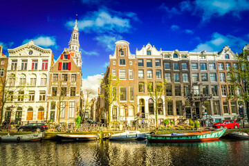 Fototapeta premium Houses facades over canal water, Amsterdam, Netherlands